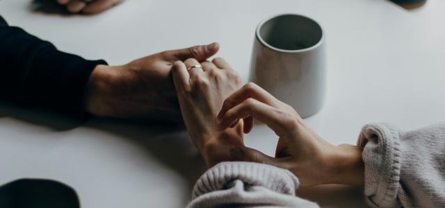 person in black long sleeve shirt holding white ceramic mug by Priscilla Du Preez 🇨🇦 courtesy of Unsplash.